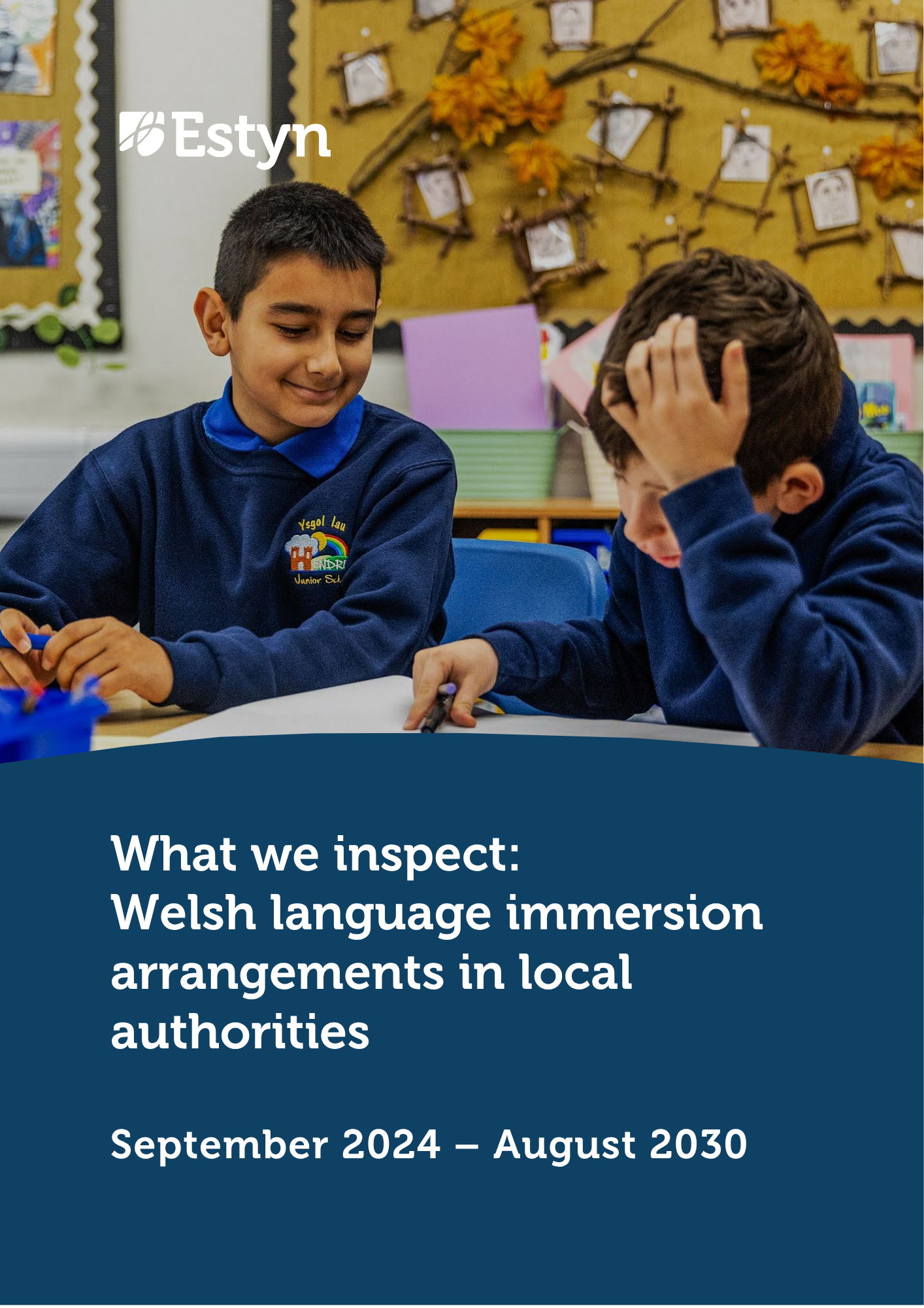 Two primary school pupils taking part in a classroom learning activity.