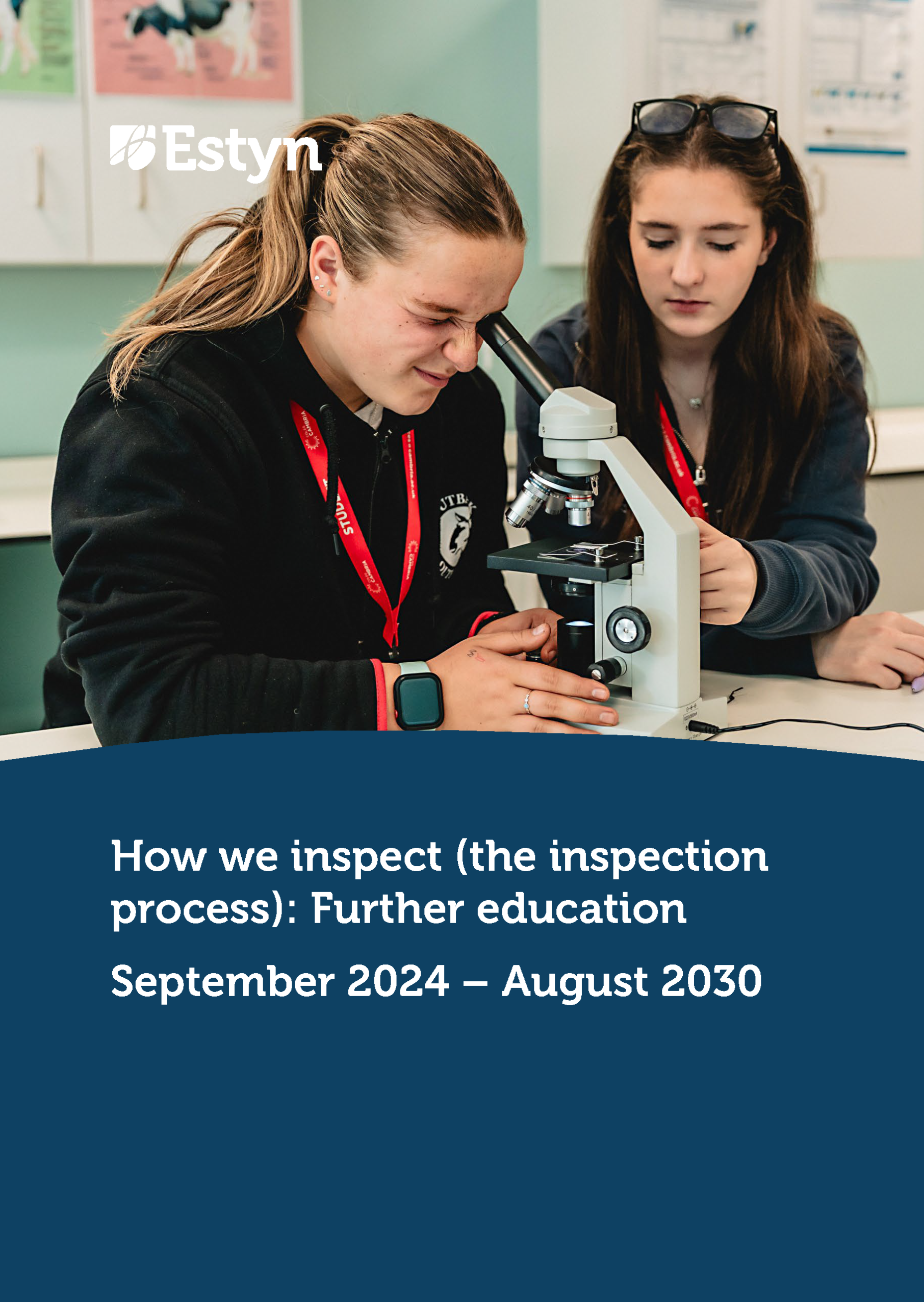 Two learners using a microscope during a science lesson, examining a specimen and working together in a laboratory classroom.