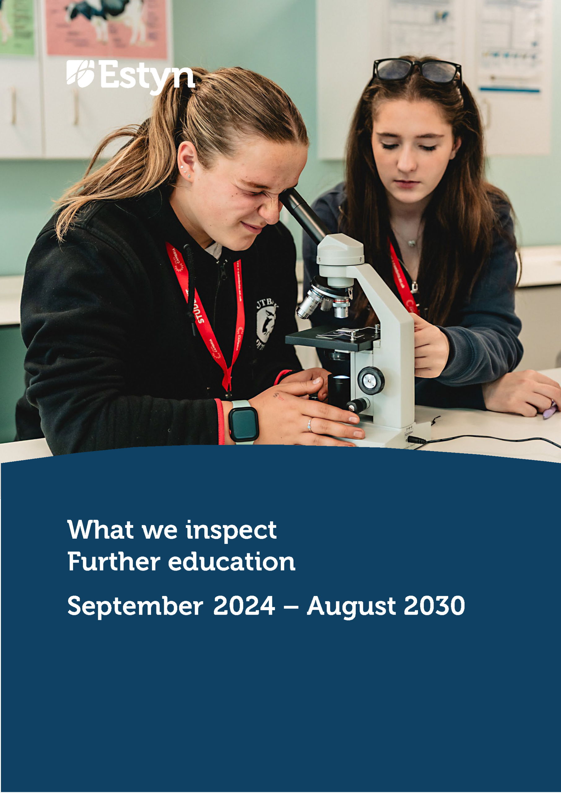 Two learners using a microscope during a science lesson, examining a specimen and working together in a laboratory classroom.