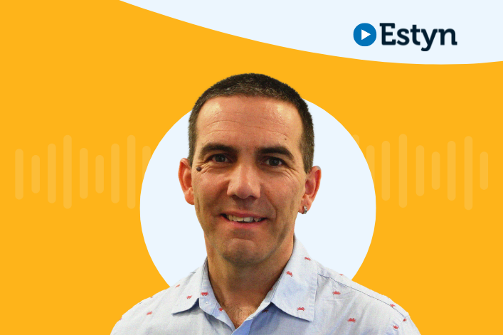 A portrait of a professional individual with the Estyn logo on the upper right, set against a dual-tone background of yellow and white.