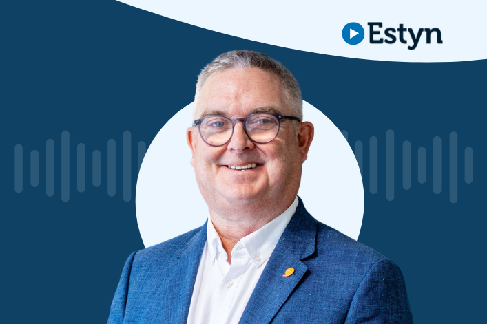 A studio-style portrait of a person set against a dark blue graphic background featuring a white circular shape and subtle waveform design. The Estyn logo appears in the top right corner.