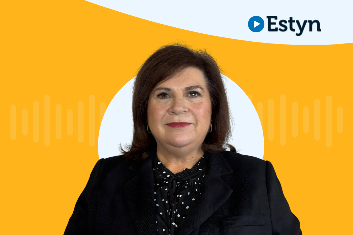 A studio-style portrait of a person set against an yellow graphic background featuring a white circular shape and subtle waveform design. The Estyn logo appears in the top right corner.