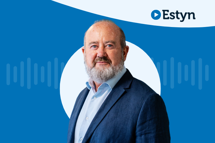 A studio-style portrait of a person set against a bluegraphic background featuring a white circular shape and subtle waveform design. The Estyn logo appears in the top right corner.